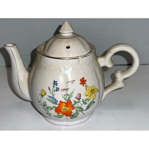 Tea Pot UOGC Musical ( Has Stress Fractures & One Small Chip. Still Plays Music